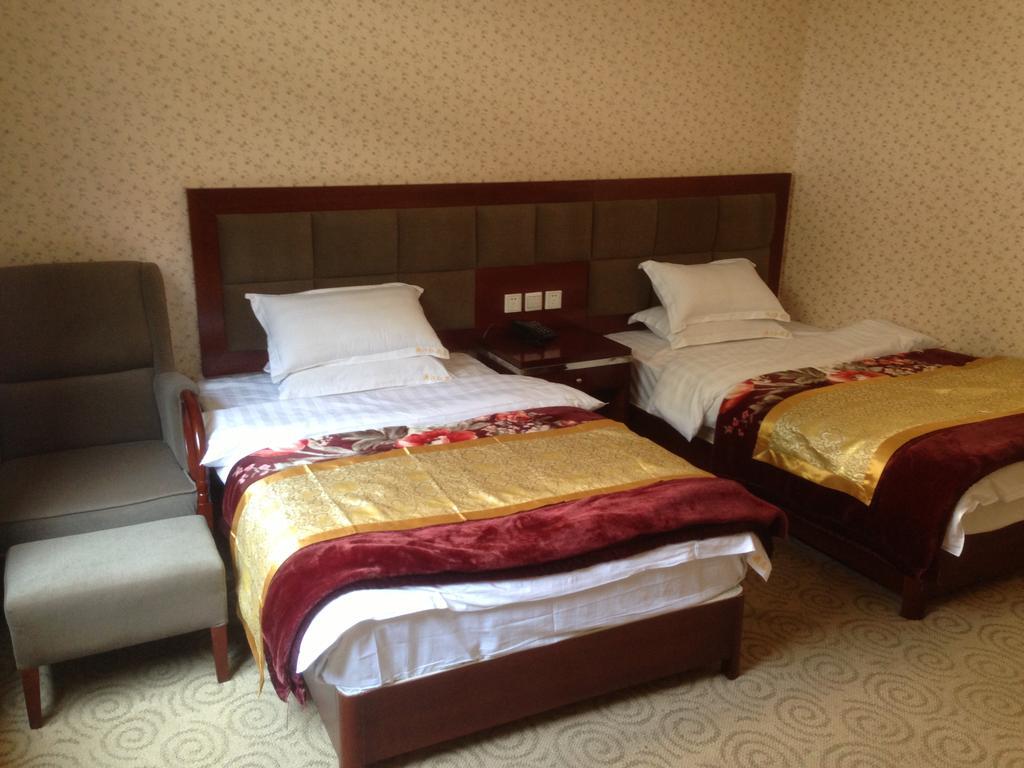 Jiuzhaigou Man Jiang Hong Hotel Kamer foto